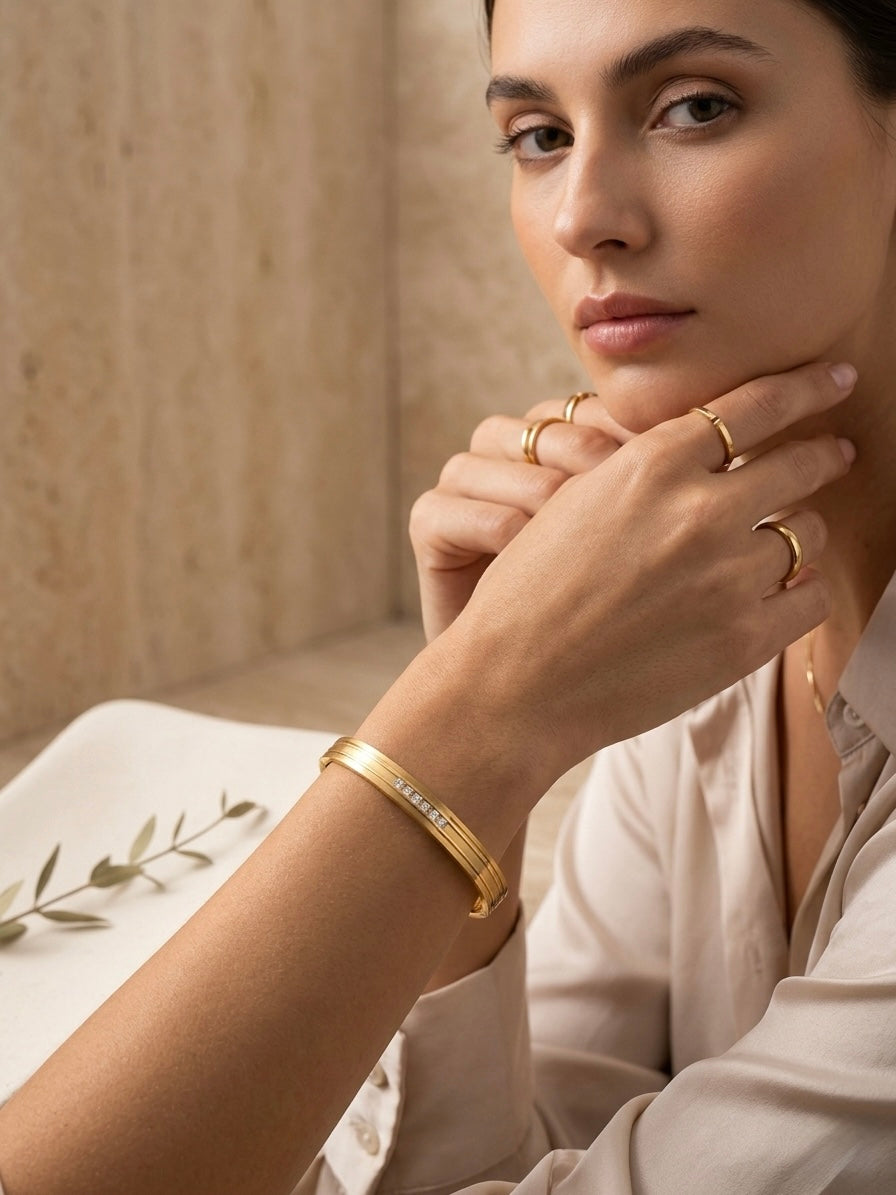 Luxury stacked gold diamond cuff bracelet.