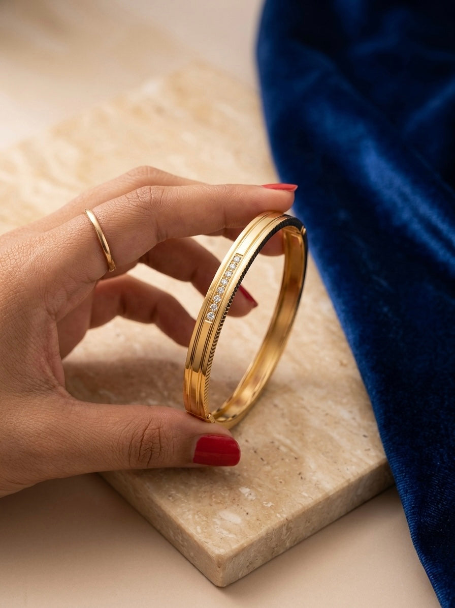 Luxury stacked gold diamond cuff bracelet.