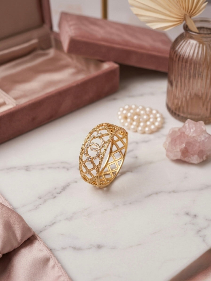 Luxurious cutout gold textured statement bracelet.