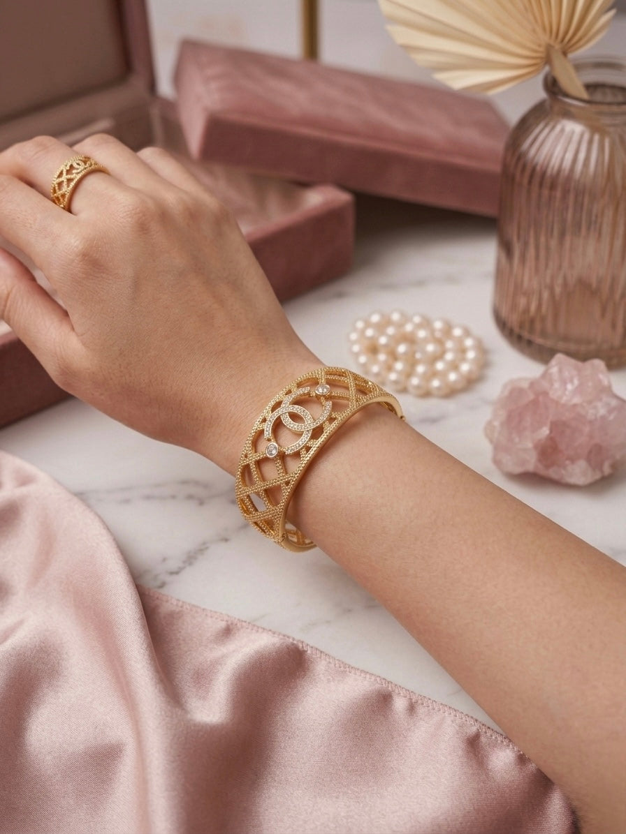Luxurious cutout gold textured statement bracelet.
