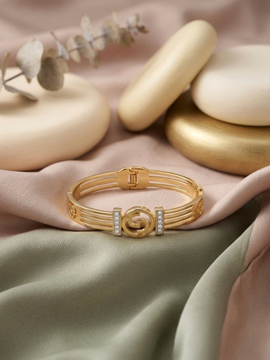 Modern split-band gold crystal statement bangle