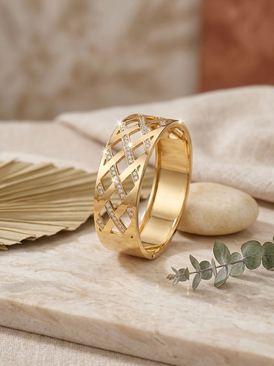 Luxurious cutout geometric gold diamond cuff.