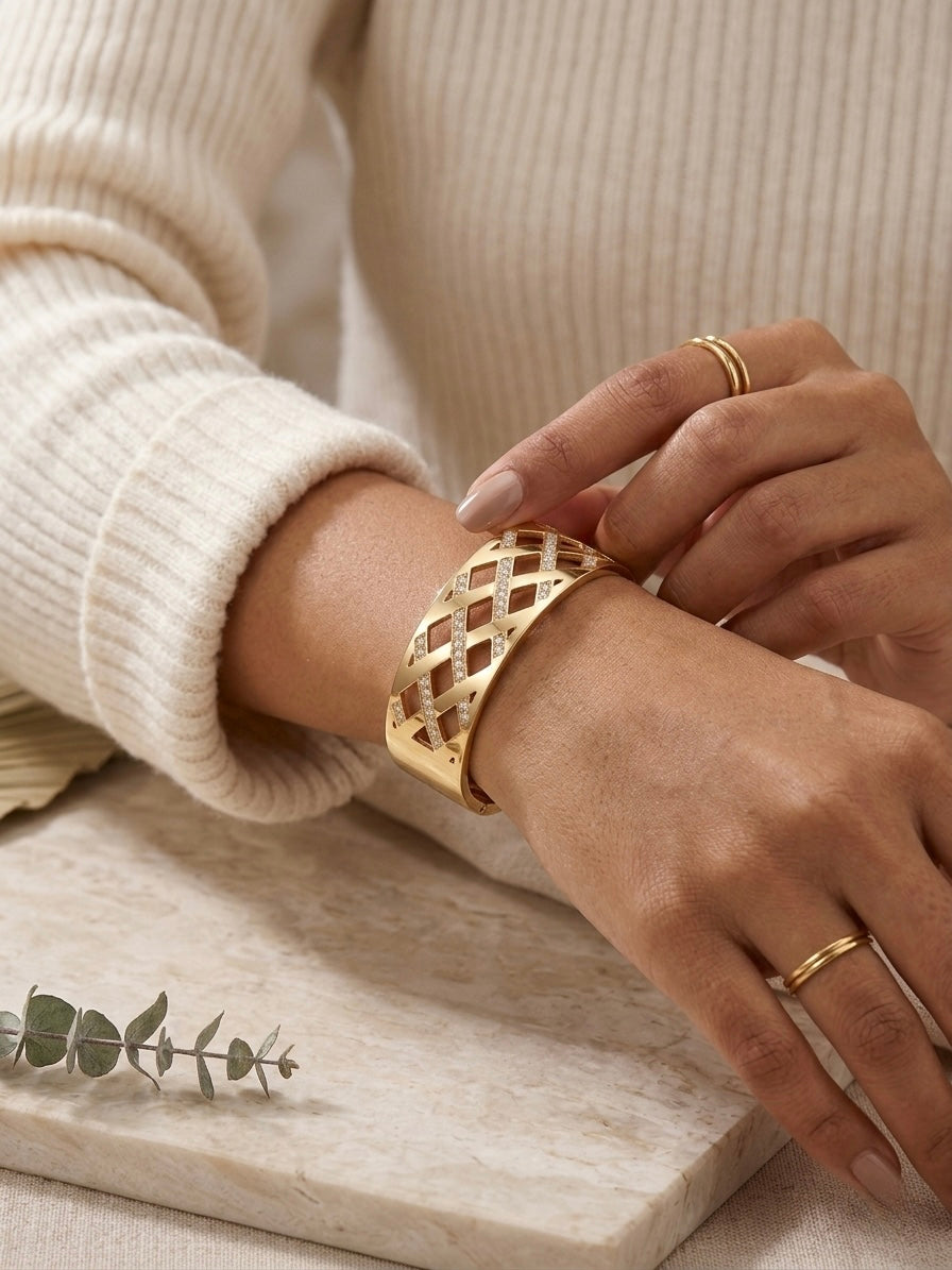 Luxurious cutout geometric gold diamond cuff.