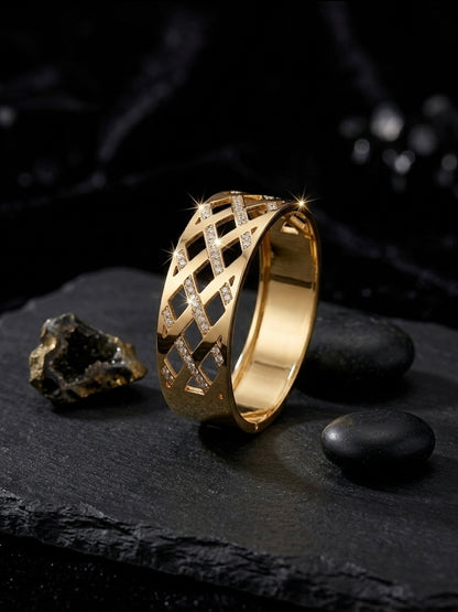 Luxurious cutout geometric gold diamond cuff.