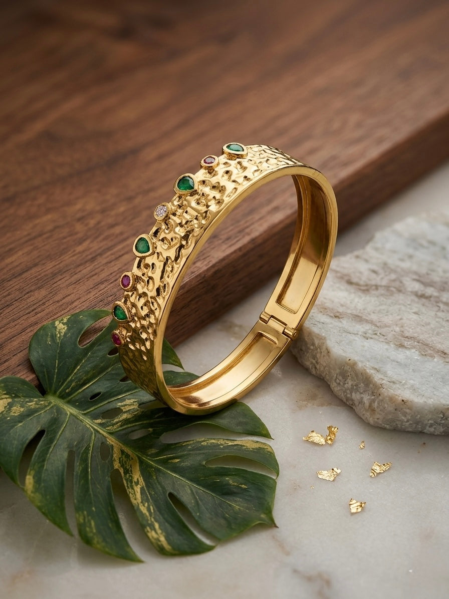 Artisan textured gold colorful gemstone cuff.
