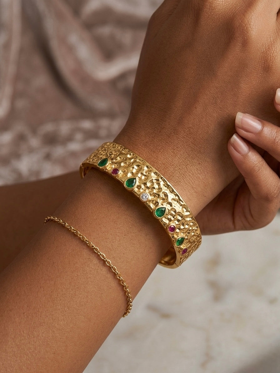 Artisan textured gold colorful gemstone cuff.
