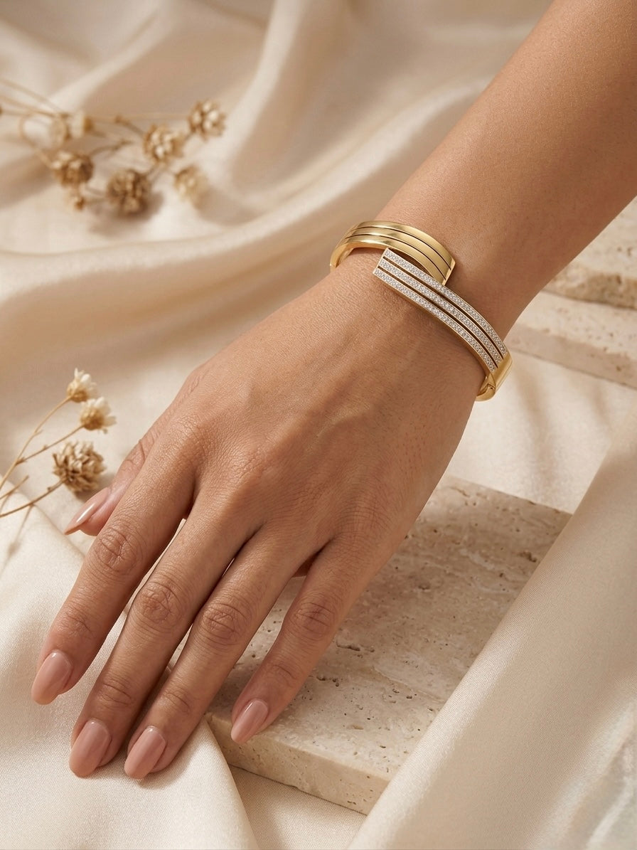 Elegant split-band pave diamond gold bracelet.