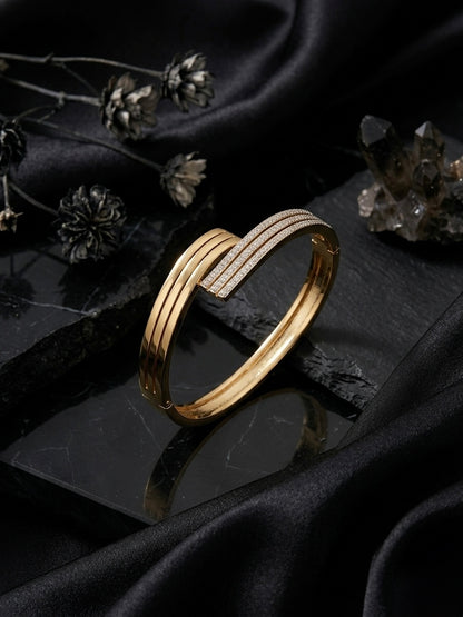 Elegant split-band pave diamond gold bracelet.