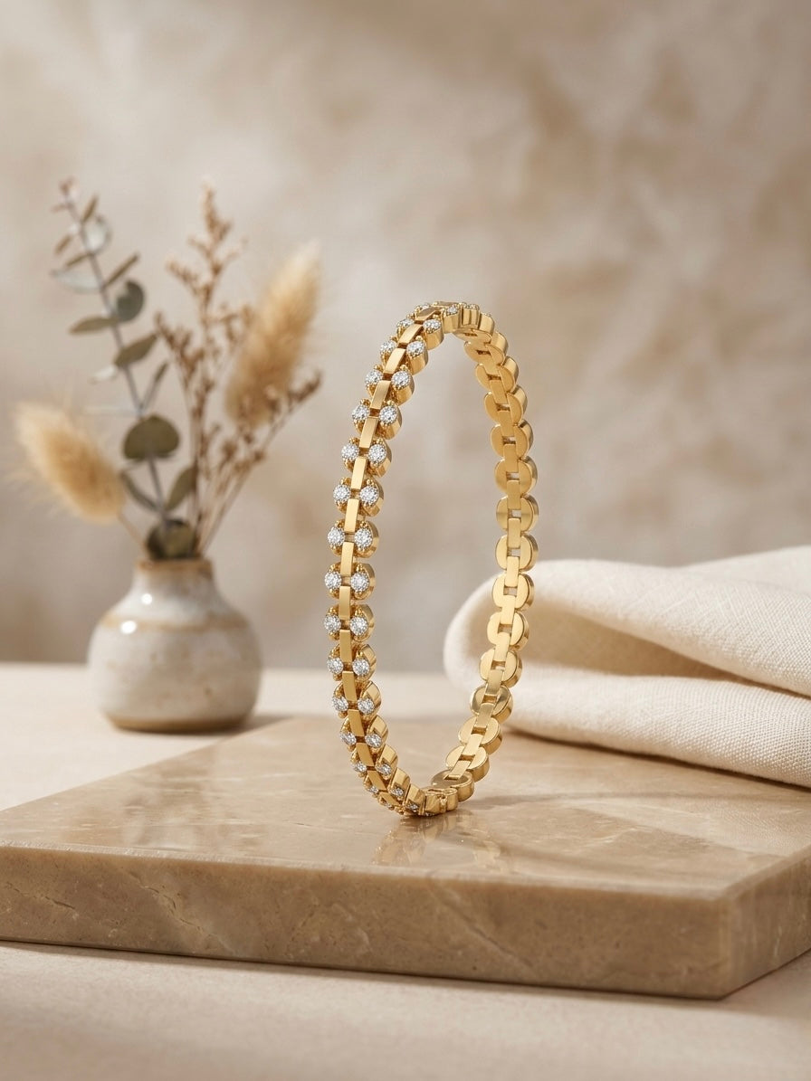 Gold watch-link crystal tennis bangle.