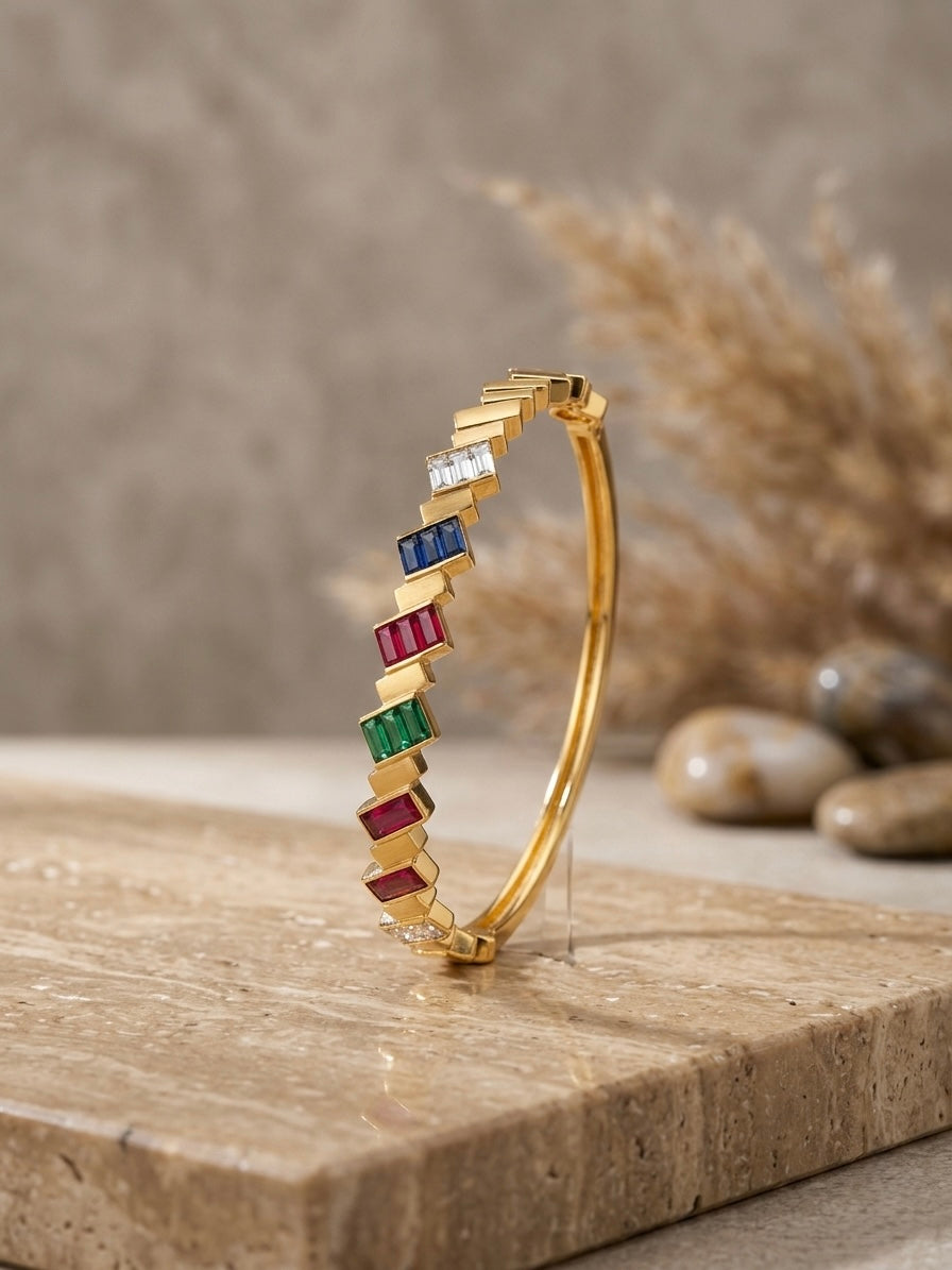 Gold multi-gemstone baguette staircase bracelet.
