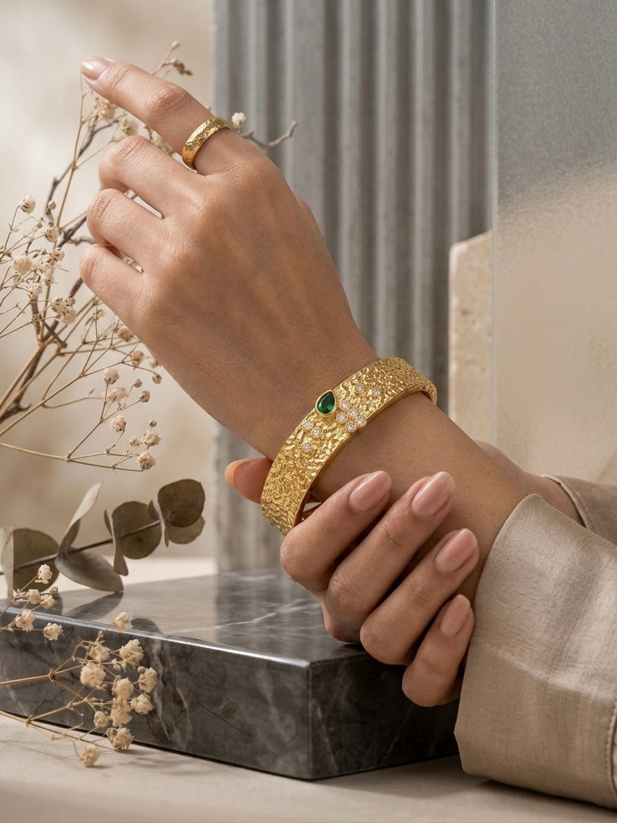 Textured gold emerald crystal organic bangle.