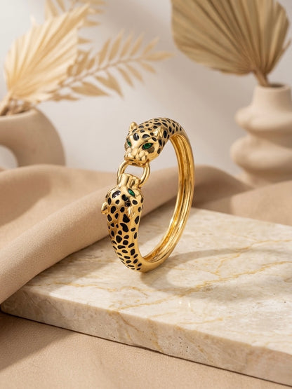 Luxury gold twin leopard enamel bracelet.