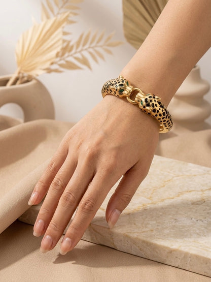 Luxury gold twin leopard enamel bracelet.