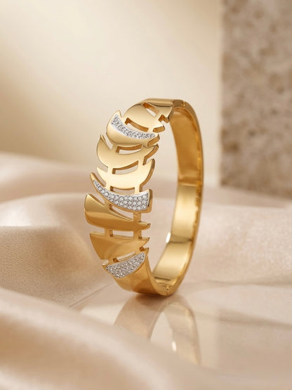 Gold cutout leaf crystal accented bracelet