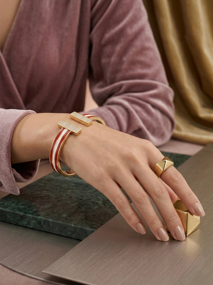 Gold enamel T-bar crystal open bracelet.
