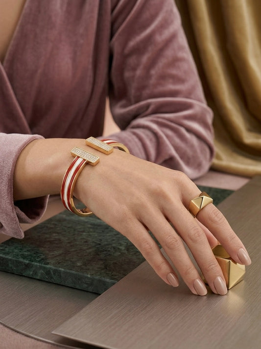 Gold enamel T-bar crystal open bracelet.