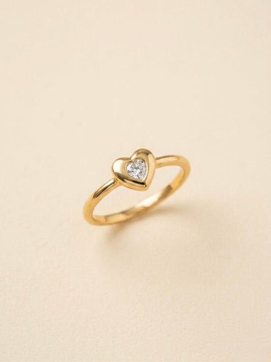 Elegant gold heart diamond ring.