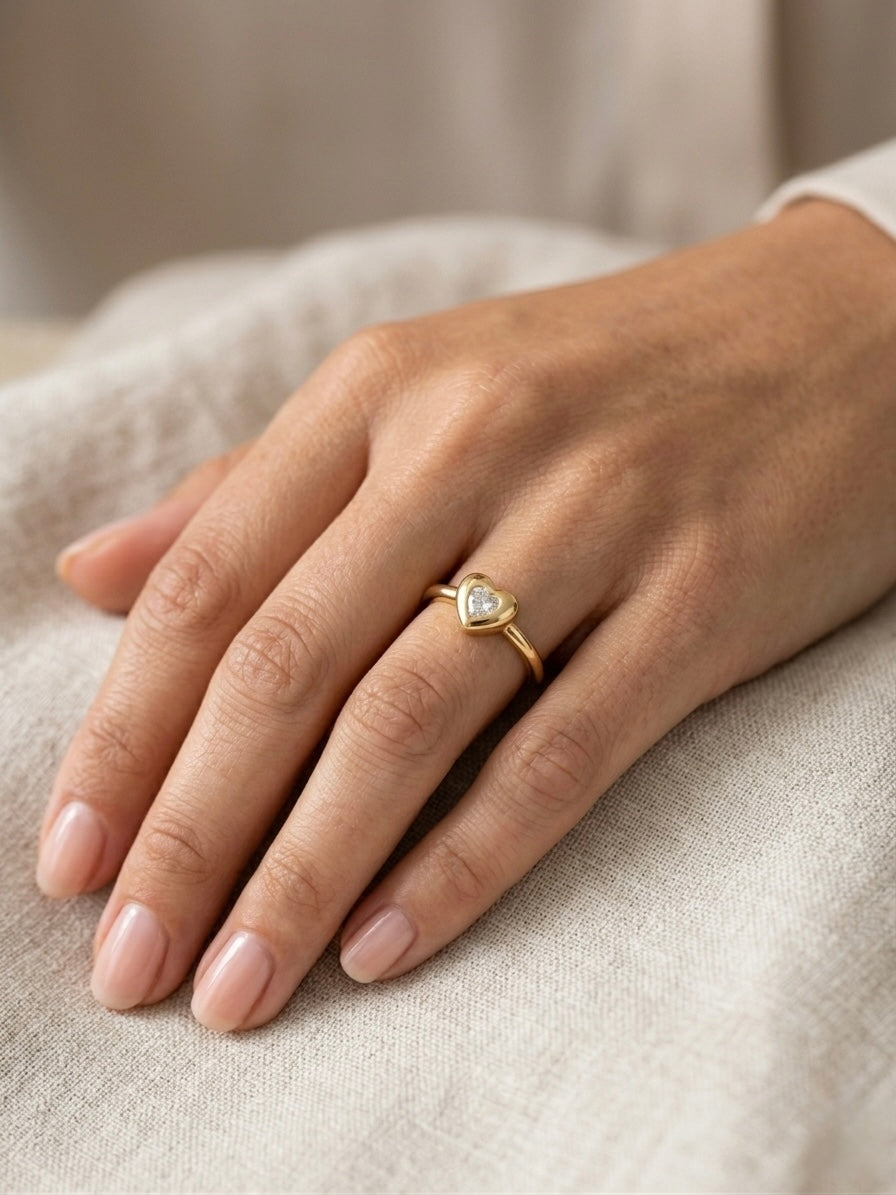 Elegant gold heart diamond ring.
