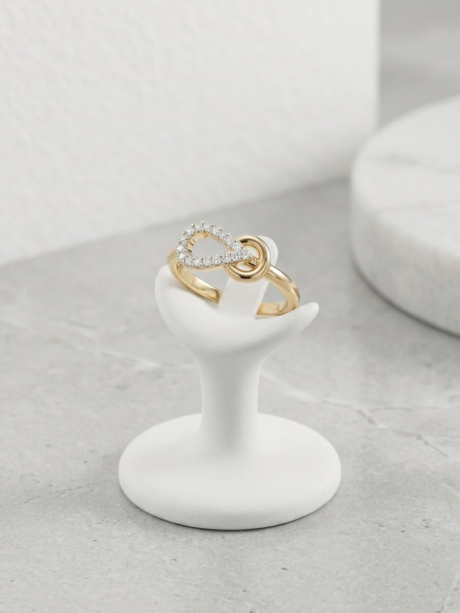 Elegant twisted infinity gold ring.