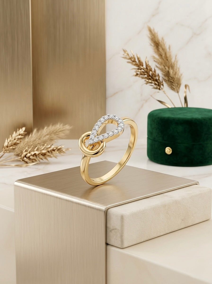 Elegant twisted infinity gold ring.