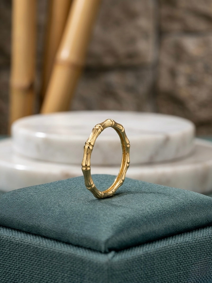 Elegant gold bamboo-inspired stackable ring.