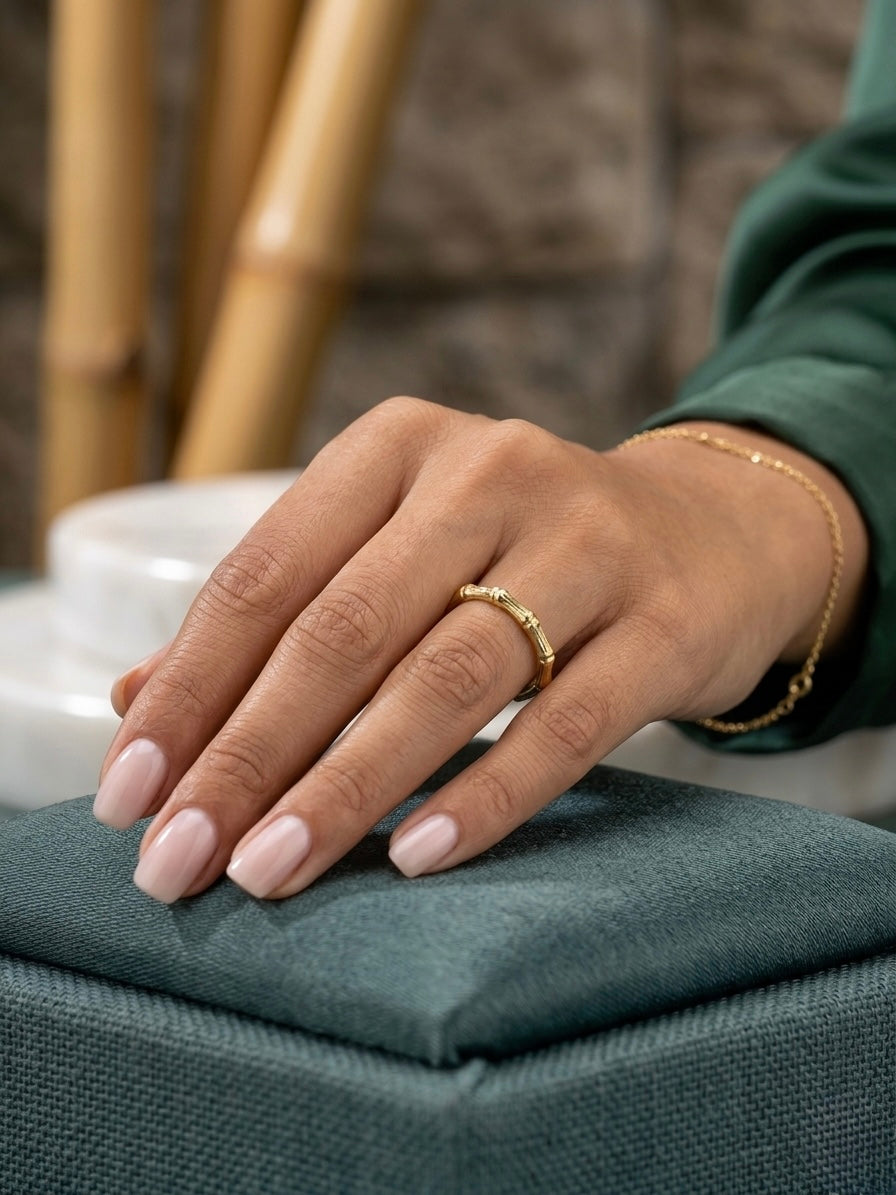 Elegant gold bamboo-inspired stackable ring.