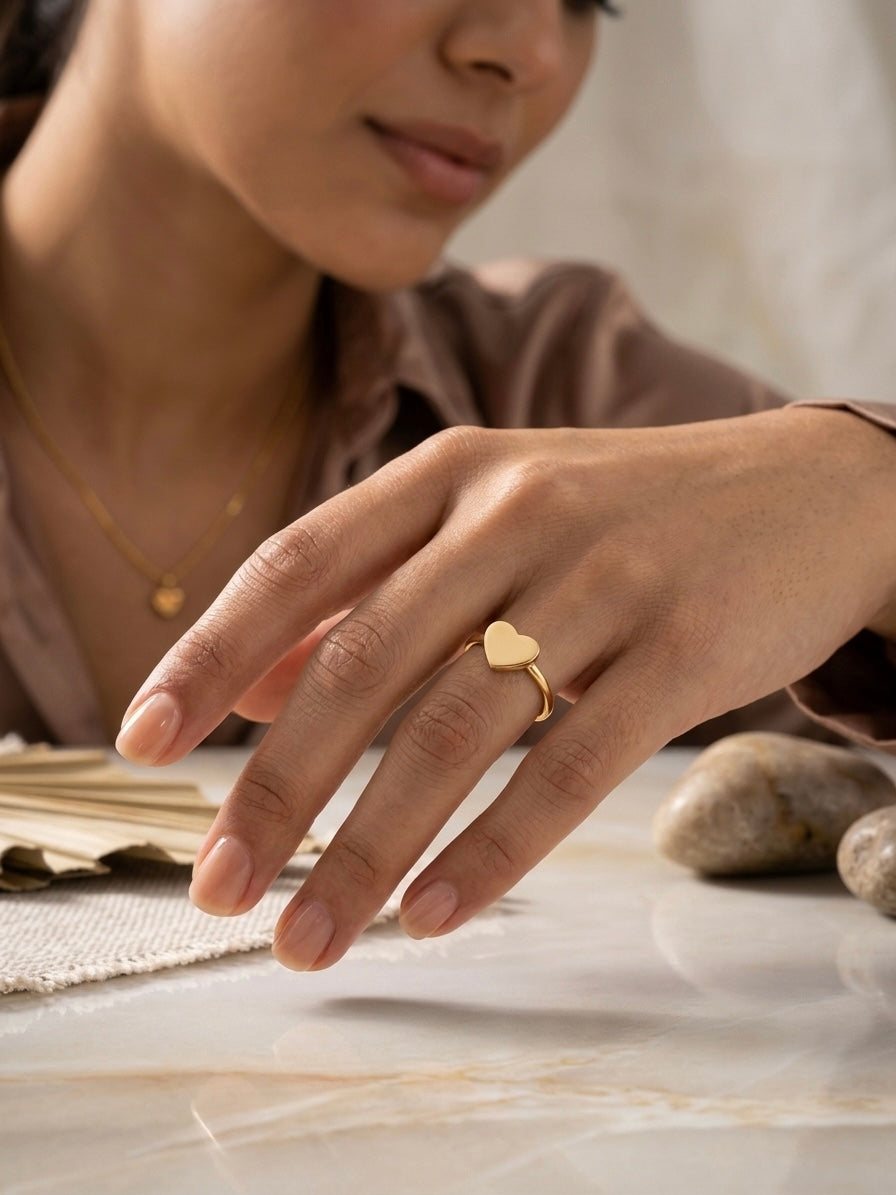 Simple and elegant gold heart ring.