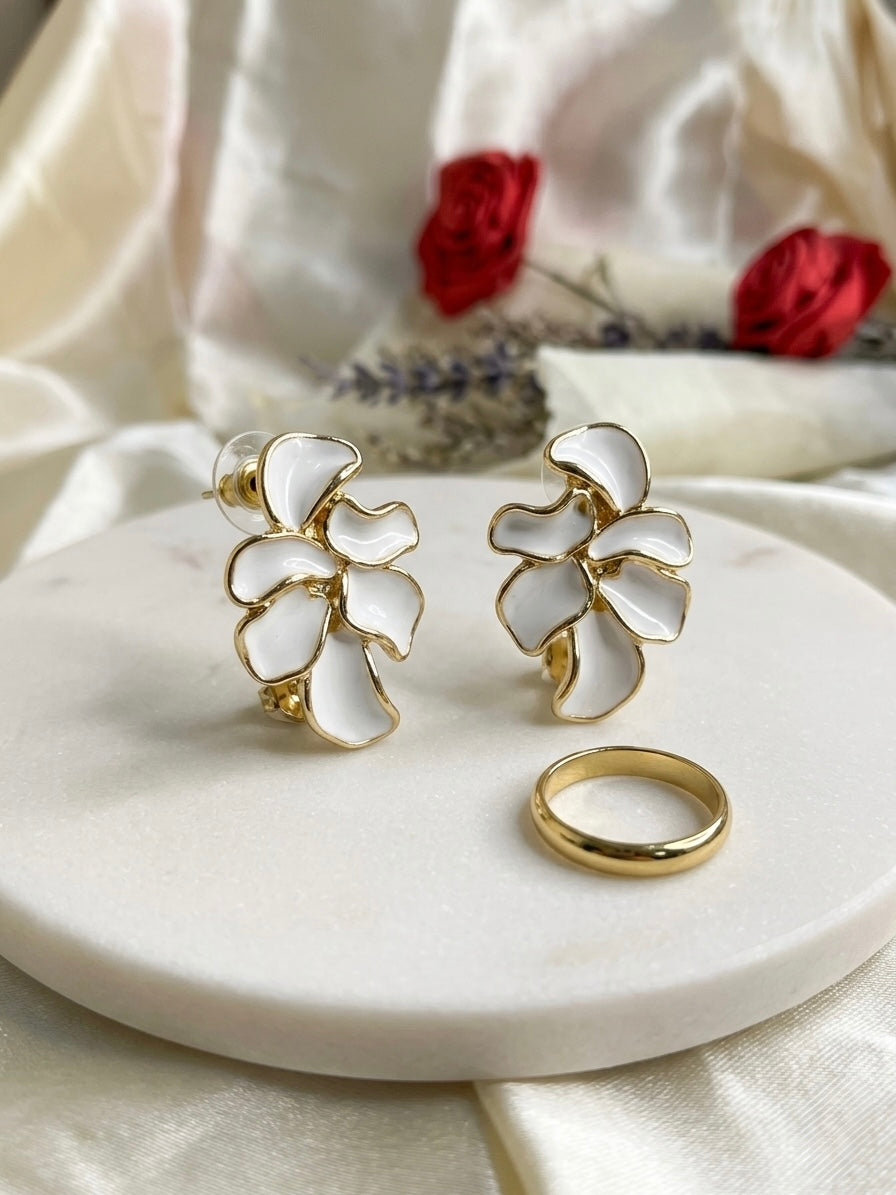 Elegant white enamel flower cluster earrings.