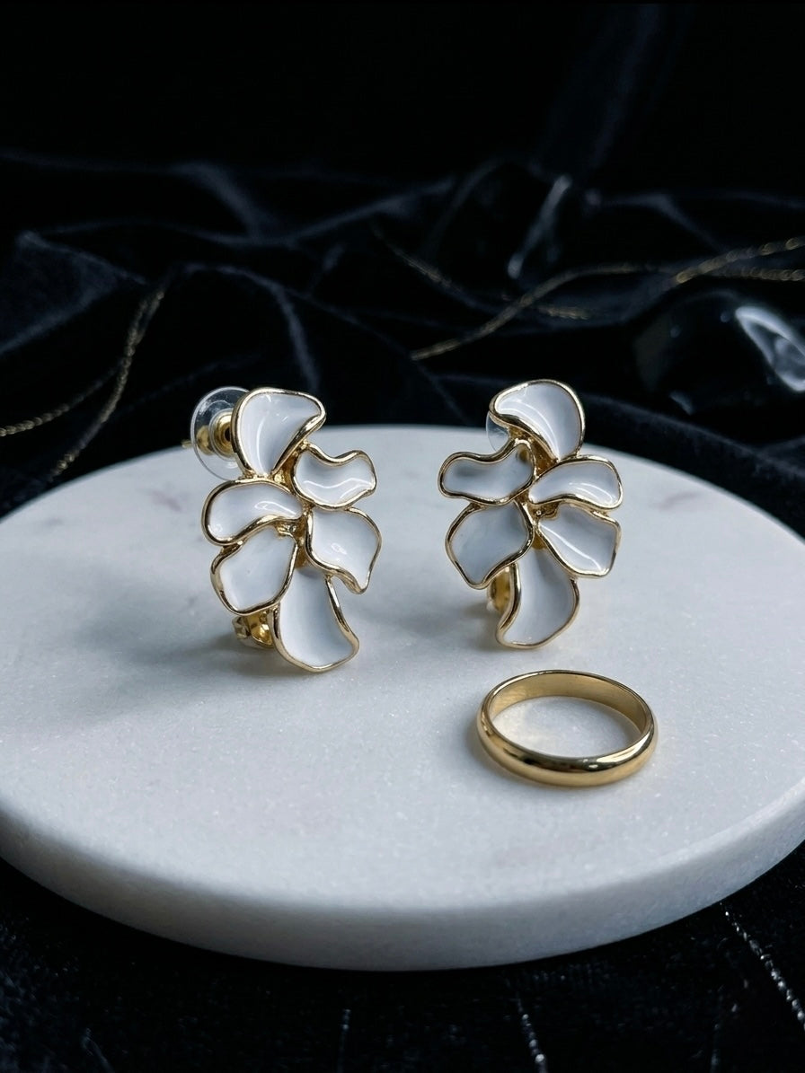 Elegant white enamel flower cluster earrings.