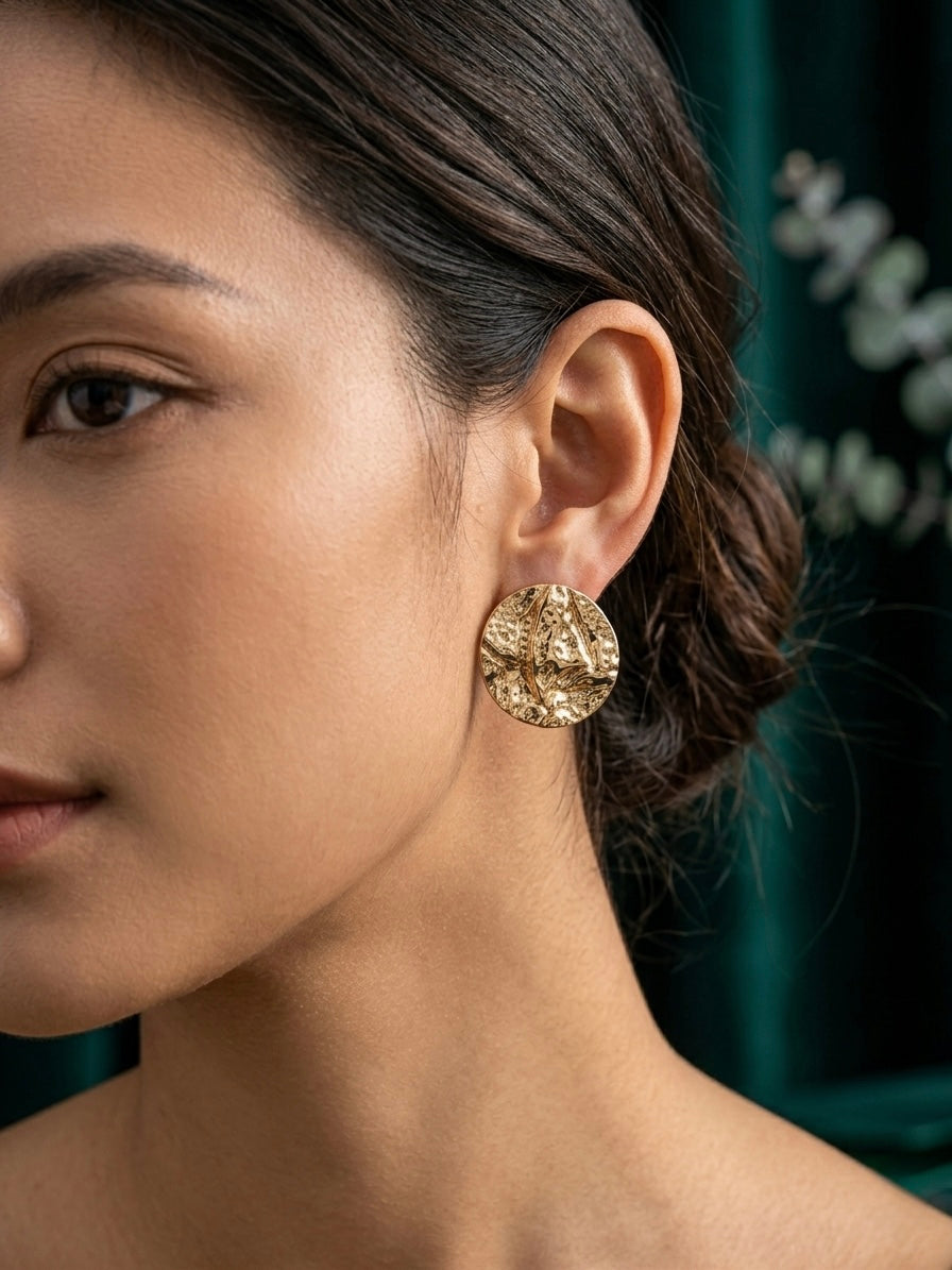 Elegant molten-surface anti-tarnish gold earrings.