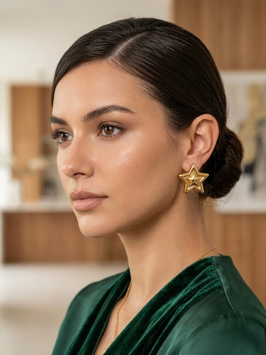 Elegant high-polish layered star earrings.