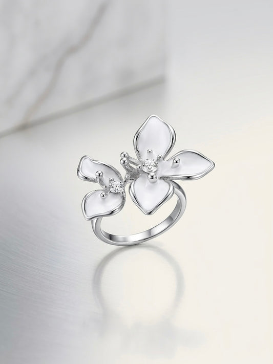 Charming silver white enamel flower ring.