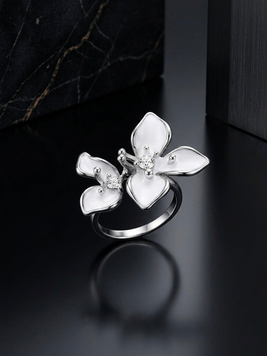 Charming silver white enamel flower ring.