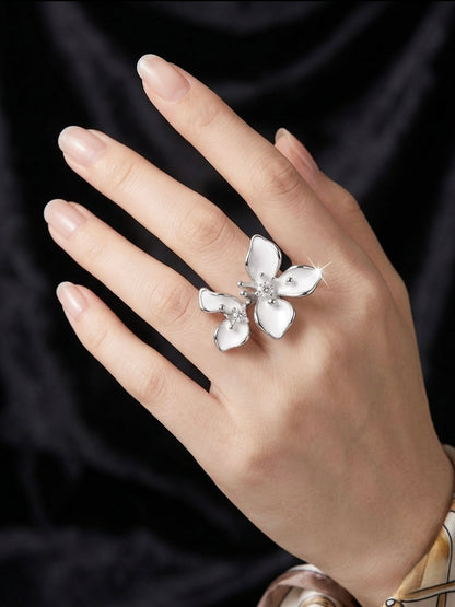 White enamel dual flower ring by Nola