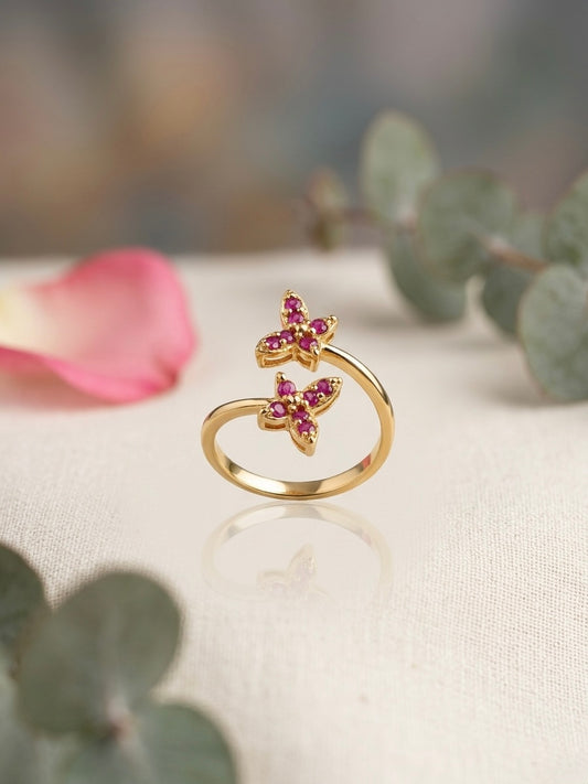 Charming gold bypass ruby flower ring.