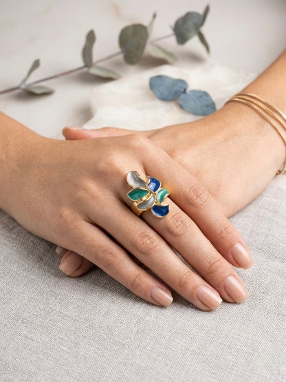 Enamel leaf ring showing green, blue and teal petals