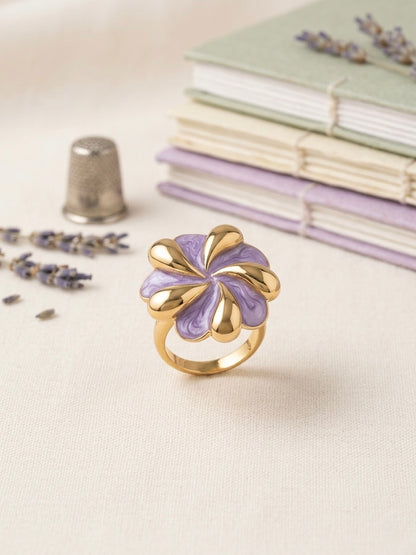 Elegant gold and lavender enamel ring.