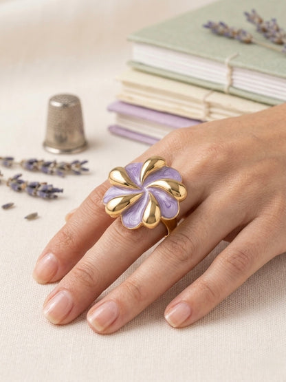 Elegant gold and lavender enamel ring.