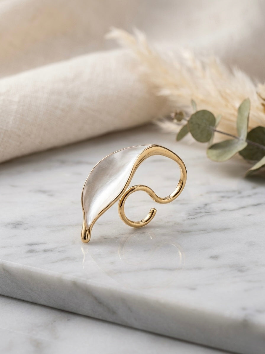 Elegant gold mother-of-pearl abstract ring.