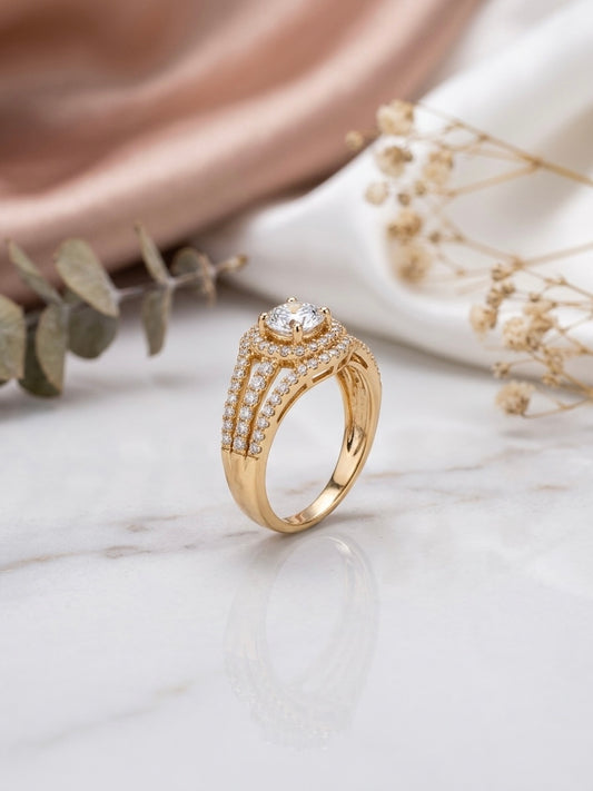 Stunning gold halo split-shank diamond ring.