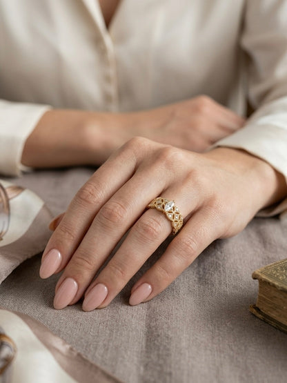 Vintage-inspired gold lattice diamond ring.