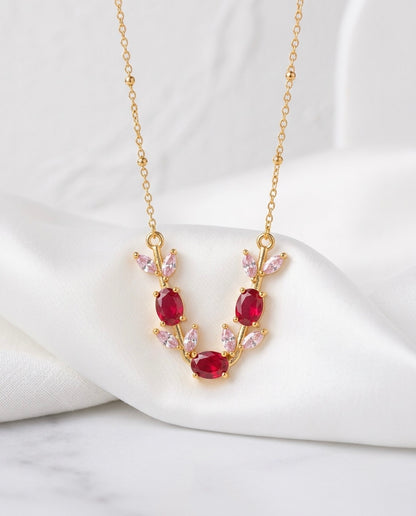Stunning gold necklace with tulip design.