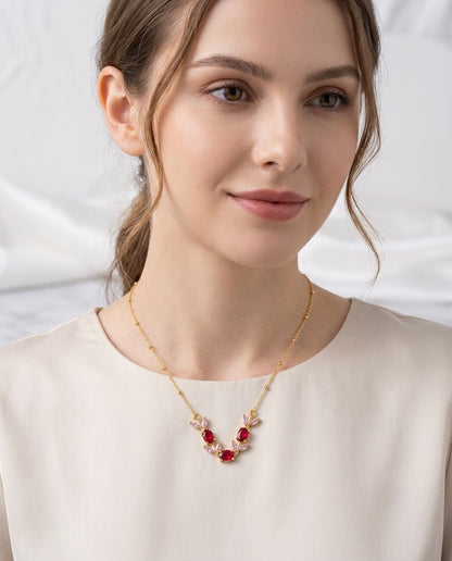 Stunning gold necklace with tulip design.