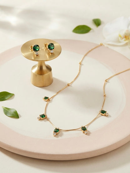 Delicate emerald stone necklace set.