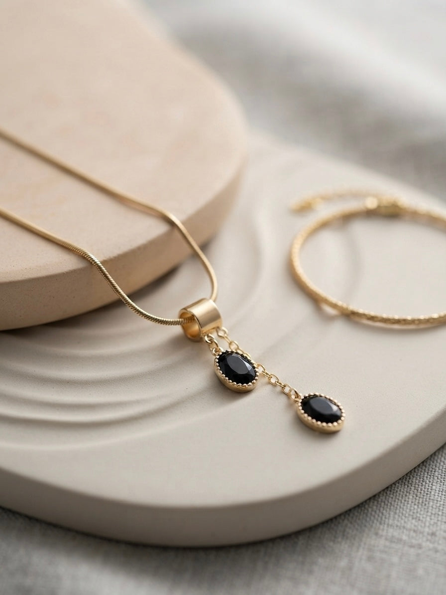 Elegant gold drop necklace set.
