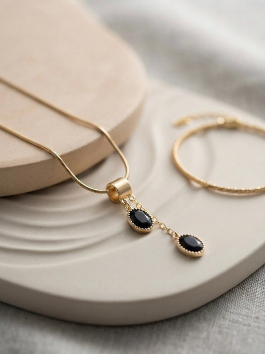 Elegant gold drop necklace set.