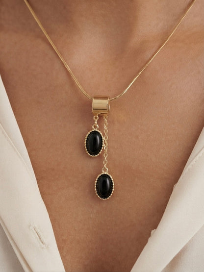 Elegant gold drop necklace set.