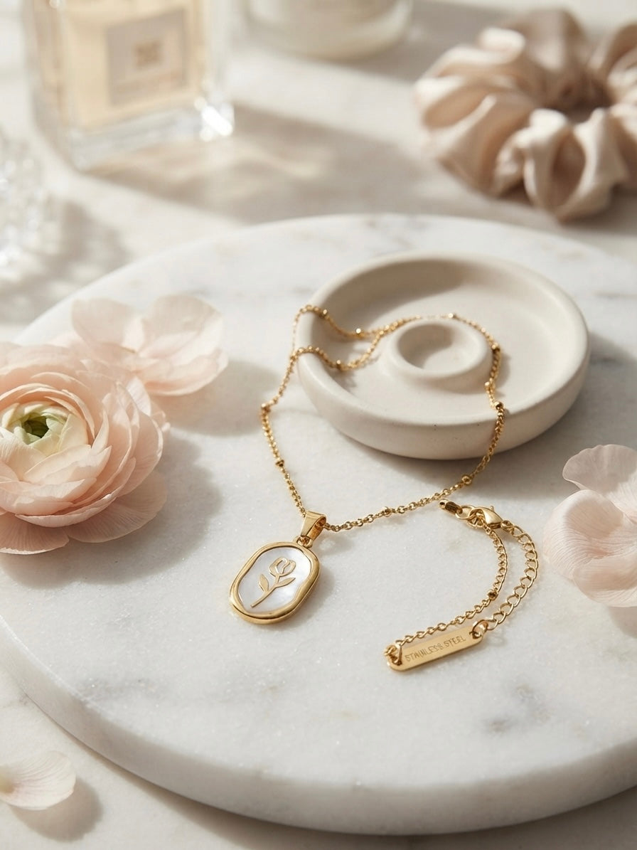 Elegant gold tulip pendant necklace.