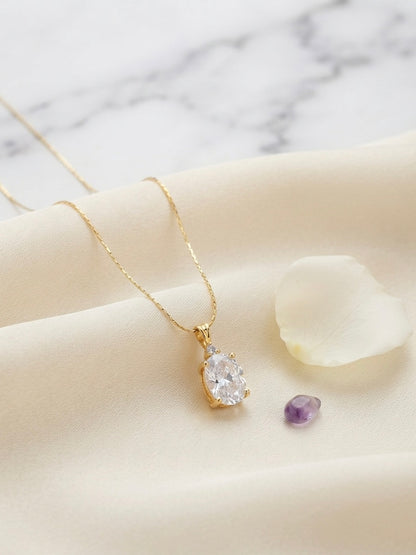 Timeless gold oval solitaire necklace.
