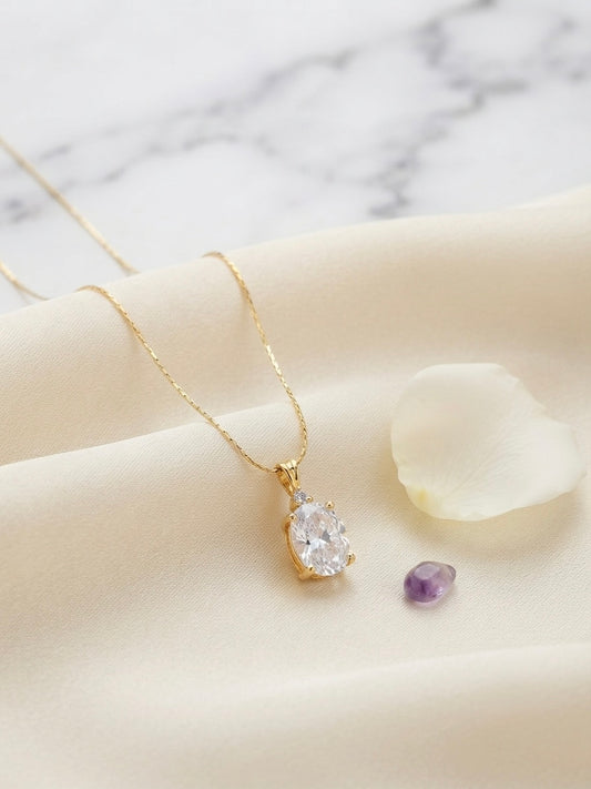 Timeless gold oval solitaire necklace.